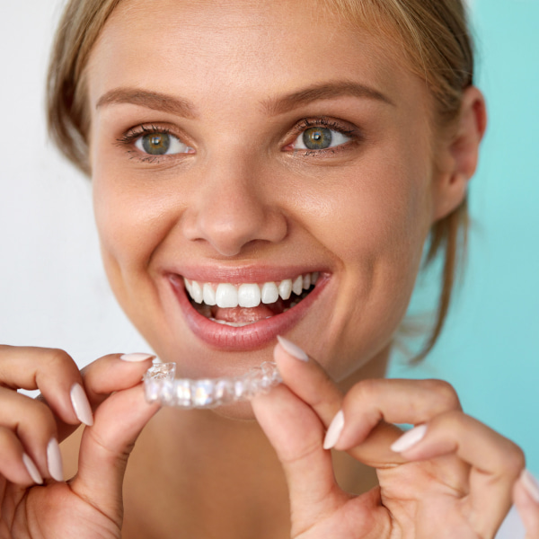A girl start to wearing a clear aligners
