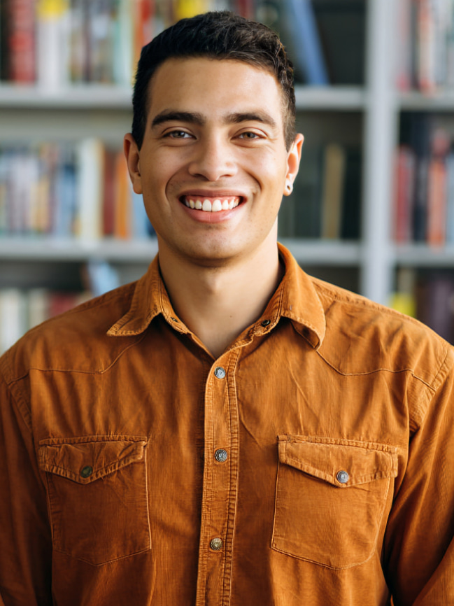 A smiling guy in the library 
